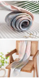 Silk scarf detail view, elegant rolled fabric design and draped on wooden chair background.
