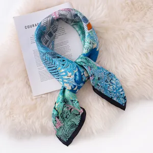 Luxury mulberry silk square scarf for women, elegant blue botanical architectural print wrap.