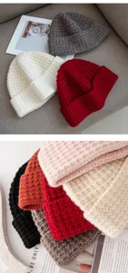 Close-up detail of Korean style knit beanie, soft square grid wool blend, cozy winter warm hat.