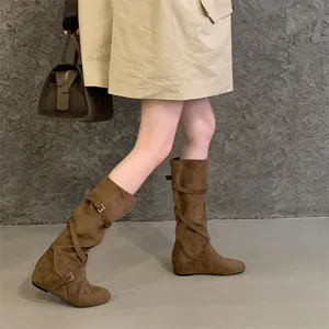 Brown suede slouchy knee-high boots with buckle and hidden wedge for women detail shot