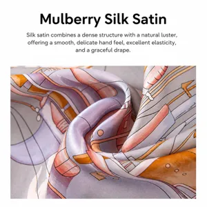 Luxury mulberry silk square scarf featuring elegant drape and artistic abstract print.