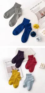Detail view of breathable solid color wool casual couple socks in various vibrant colors.