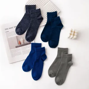 Comfortable solid color wool blend mid-tube casual socks for daily wear and couples.