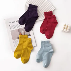 Comfortable solid color short wool socks for women and men, stylish autumn winter crew socks.