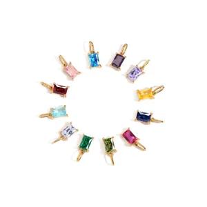 Detailed view of colorful rectangular zircon stainless steel gold plated DIY birthstone charm.