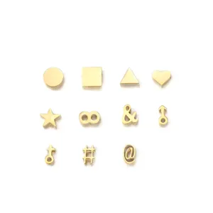 Gold stainless steel geometric shape and symbol charms DIY jewelry pendants set for crafting.