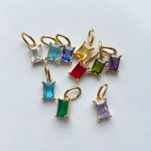 Colorful rectangular cubic zirconia pendants with gold-plated bails. Ideal for DIY jewelry.