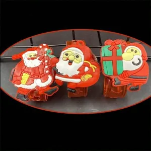 Details of Christmas glowing bracelet featuring cute Santa Claus and gift designs for kids party.
