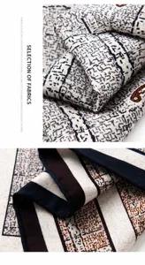 Detailed view of a vintage paisley wool silk scarf featuring delicate hand-rolled hems.