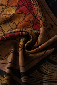 Vintage mulberry silk scarf detail shot, elegant artistic print with smooth drape.