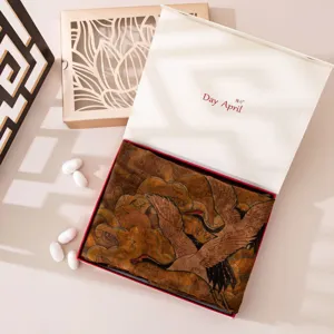 Main view of a retro mulberry silk square scarf with elegant crane print in gift box.