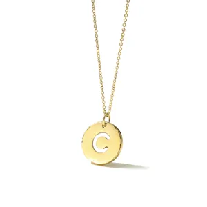 Gold stainless steel initial letter C pendant necklace detail, elegant jewelry accessory design.