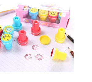 Close-up of colorful cartoon smiley face stamp set details with cute designs for kids.