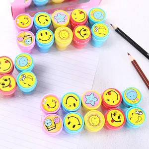 Cute cartoon smiley face stamps set for kids school stationery and creative classroom rewards.