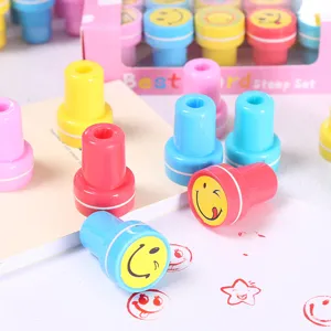 Colorful cartoon smile self-inking stamp set for kids, creative school stationery and toys.