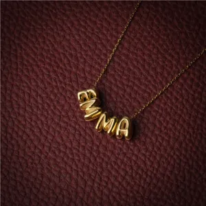 Gold 3D bubble letter EMMA necklace, dainty custom initial pendant accessory for daily wear.