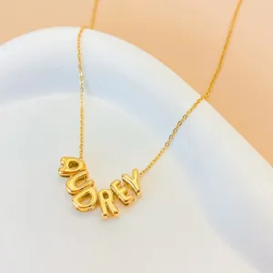 Gold 3D bubble letter Audrey necklace dainty custom pendant jewelry detail close up display
