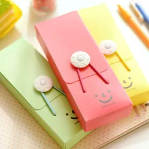 Cute creative stationery pencil box with button string closure and lovely smile design for desk.