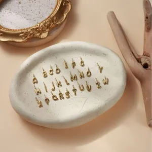 Ciondoli lettere alfabeto 3D dorate in acciaio inossidabile accessori gioielli DIY.
