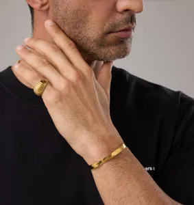 Men's stainless steel gold plated open cuff bracelet and minimalist ribbed dome ring set.