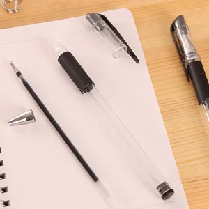 European standard gel pen set with disassembled parts and assembled pen on notebook main view
