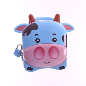 Jolie tirelire en forme de vache bleue en fer blanc avec cadenas et clés pour enfants