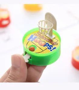 Mini basketball shooting game toy detail view, handheld plastic finger toy, compact design.