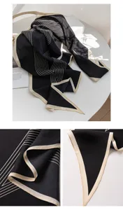 Silk rhombus scarf detail showcasing black and white striped design and fine fabric texture.