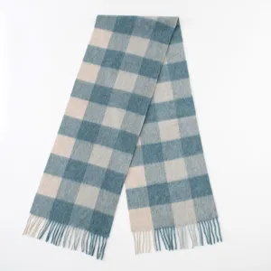 Classic blue and beige plaid wool scarf with elegant fringe, warm and stylish winter accessory.