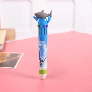 Detailed view of the cute shark multi-color ballpoint pen, close-up product shot.