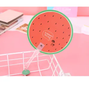 Watermelon fan detail showing cute fruit pattern, transparent plastic handle and mini hanging tag.