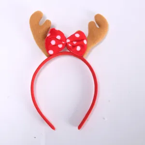 Christmas reindeer antlers headband with red polka dot bow for holiday party hair accessories.