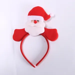 Close-up detail of a cute Santa Claus Christmas headband with plush festive holiday design.