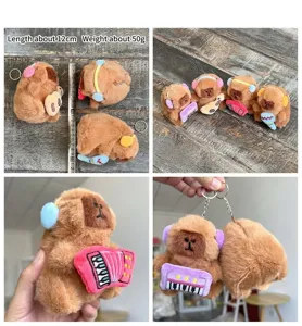 Close-up details of cute musical capybara plush toy pendant holding instruments with soft texture.