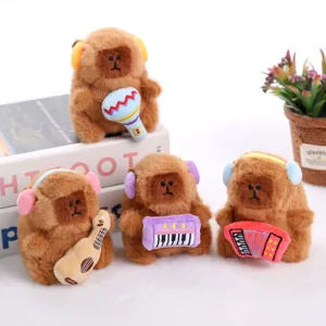 Cute music capybara plush toys pendant set, soft stuffed animals holding instruments for gifts.