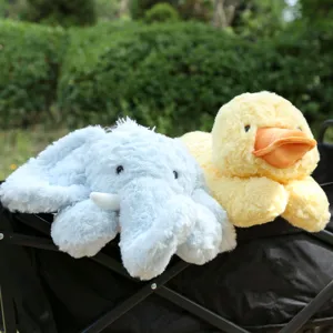 Fluffy floppy blue elephant and yellow duck plush toys, soft cute stuffed animal pillows for kids.