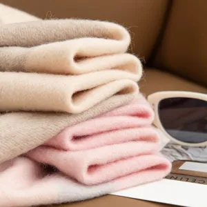 Cozy wool plaid winter scarf for men and women, thick and warm fashion neck wrap accessory.