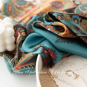 Detailed view of women luxury mulberry silk paisley square scarf shawl, elegant neckwear accessory.