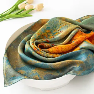 Mulberry silk square scarf featuring abstract artistic print, elegant neck accessory detail.