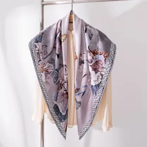 Exquisite silk square scarf with floral and butterfly print, elegant neck accessory for women.