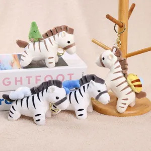 Cute plush zebra keychain with lovely mini backpack doll pendant for bags and keys.