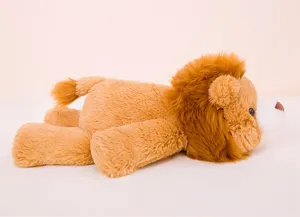 Vista dettagliata del leone di peluche morbido, criniera soffice e design grazioso come dono.