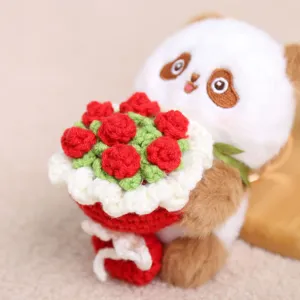 Cute crochet panda holding flower plush toy keychain, soft plush bag pendant accessory.
