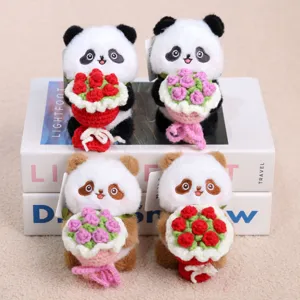 Cute plush panda keychain holding a handmade crochet flower bouquet toy bag pendant gift.
