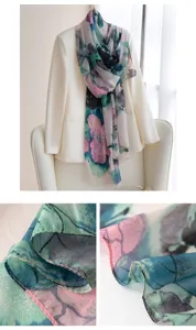 Artistic floral silk scarf detail view, elegant vintage print, fine hem stitching, smooth.