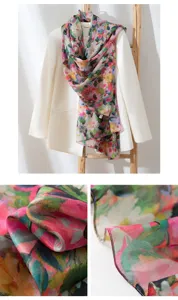 Detailed view of women long silk scarf with vintage floral print, showing soft texture and pattern.