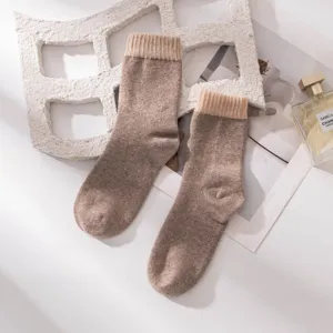 Thick wool blend mid-calf socks with cozy ribbed cuffs, soft texture and warm autumn winter wear.