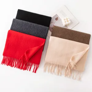 Solid color cashmere scarf winter thickened soft warm tassel scarf for women and men daily wear.