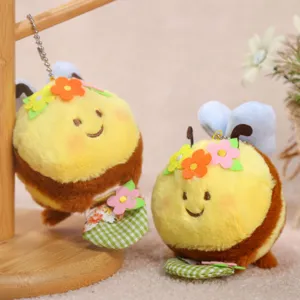 Cute honey bee plush toy keychain with flower basket, soft stuffed doll pendant for girls.