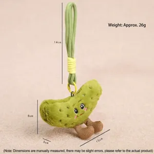 Cute pickle plush pendant keychain, soft vegetable doll toy with hanging rope for bag decoration.